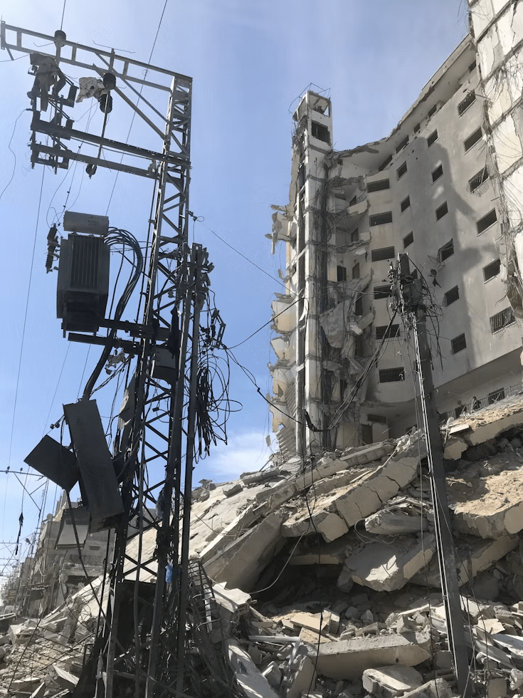 a destroyed 10-story building in the Gaza Strip